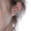 Chic Frosted Silver Earpiece Designed With Curved Tail And 6
