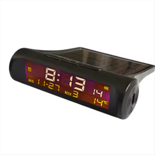 Relógio digital automotivo solar com painel, data e termômetro, visor LCD e fundo luminoso.
