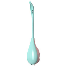 Elegante cepillo de baño de cerámica con cerdas de nailon curvadas y mango ergonómico antideslizante. Diseño que ahorra espacio para lavabos,