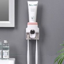 Distributeur automatique de dentifrice rose, fonctionnement sans contact par aspiration pour une hygiène optimale, fixation sans dommage et coupelle