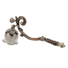 Antique candle extinguisher made of metal Robust extinguishing device for candles Versatile for use at home weddings and hotels and elegant