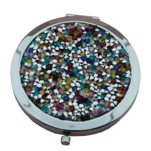 Espejo compacto con lupa, fabricado en metal de alta calidad, ideal para viajes de negocios.