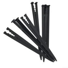 Practical plastic stakes for stable placement of drip irrigation hoses and sprinklers in gardens