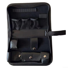 This leather organizer keeps your golf balls and tools neatly stored (black).