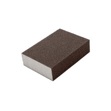 Electric scrubbing brush with extra thick abrasive sponge for cleaning cookware.