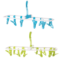 Étendoir à linge portable avec pinces antidérapantes, idéal pour les voyages. Fabriqué en plastique résistant, il est polyvalent et peu