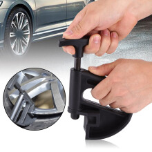 Outil universel de montage de pneus avec pince à jante et système de piston à ressort pour pneus à profil bas et runflat. Protection contre les