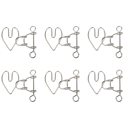 Rompecabezas de metal con forma de corazón roto