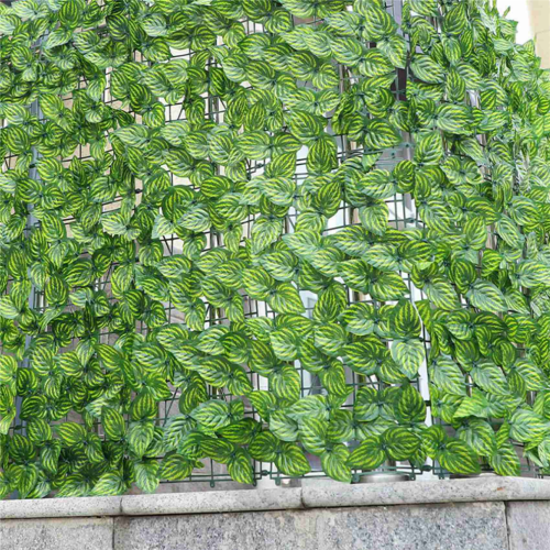 Kunstplantenhek, groene bladhekpanelen, privacyhek. 1