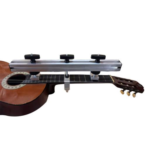 Verktyg för att korrigera deformation av gitarrhals 1