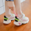 Set di 4 calzascarpe per bambini in plastica (verde, blu, giallo, rosa) 5