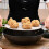 (Black) Multi-Use Silicone Splatter Guard with Folding Handle, Doubles as Strainer and Heat Resistant Mat, White. 4