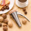 (Brown) Heavy Duty Nut Cracker with Spring Return Mechanism and Splash-Proof Lid, Effortless Long Leverage Tool, Brown. 7