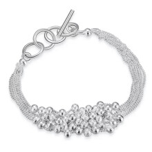 925 silver bracelet with six rows of lightcolored pearls and handdecorated pearl shapes, 20 cm.
