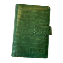Textured binder with sturdy cover featuring card slots for notes and planning