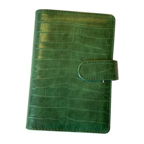 Textured binder with sturdy cover featuring card slots for notes and planning