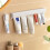 Toothpaste Holder Easy to Install Space Saving Modern Toothpaste Organizer Wall Mount Bathroom Accessory 4