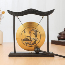 Brass table gong with handcrafted wooden frame, the accent piece for spiritual spaces and family celebrations.
