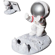 Naispuolinen astronautin työpöytäkoriste, monitoiminen hartsiavaruusmiehen puhelinteline kaikille älypuhelimille ja tableteille,