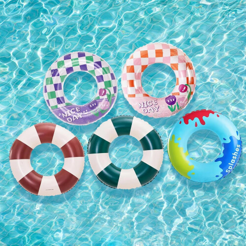 Inflatable swimming rings with colorful patterns,  for pool and beach fun. 1