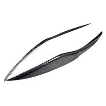 Acabamento em fibra de carbono para as pálpebras dos faróis do Ford Fiesta 2009-2011. Design elegante, resistente às intempéries e com proteção