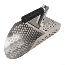Shovelshaped metal detector tool, designed to uncover hidden treasures in sandy environments.