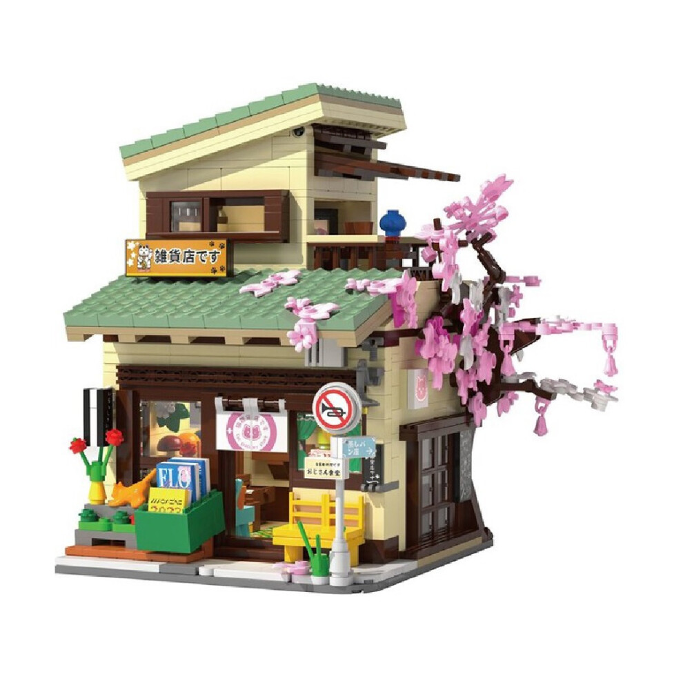 CADA Edifici - Gioco di costruzione - Negozio di alimentari Kitty - 921 pezzi - A partire da 14 anni - LED inclusi