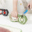Green handheld kitchen sharpener with 6 slots and nonslip mat for improved stability during use. 5