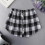 Gonna irregolare con finta camicia nera e bianca, orlo staccabile e mini sottogonna 2