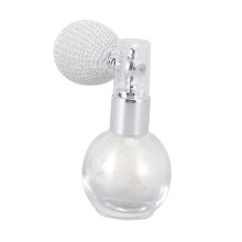 Glitter spray device for face and body with pearl white, oil formula suitable for sensitive skin types