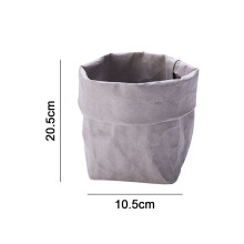 Organizador multifuncional de papel lavável e ecológico para armazenamento de pequenos itens, como alimentos e frutas.
