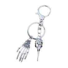 Porte-clés tête d'oiseau élégant, griffe de crâne, Souvenir