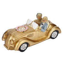 Elegante beeldjes van een ouder echtpaar: verzamelbeeldjes van hars voor hun 50-jarig jubileum, gouden huwelijksdecoratie ter ere van tijdloze