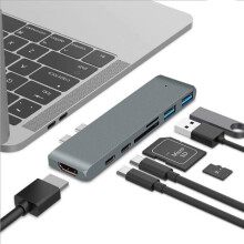 Revolusjoner arbeidsstasjonen din med vår multiportadapter, med SD/TF-kortleser og USB 3.0-porter, perfekt for kreative personer på farten.