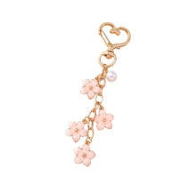 Eleganter Taschenanhänger mit Perlen und-Liebesknopf rosa