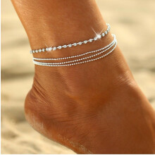 Enkelbandje voor dames, trendy en verfijnd met parels en verstelbare strass-steentjes, enkelbandje van legering met meerdere lagen, goudkleurig.