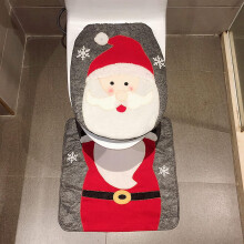 Kerstcadeau voor in huis: toiletbrilhoes en bijpassend vloerkleed met kerstmanmotief, ideaal om te decoreren met een vleugje non-woven stof en