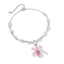 Collier élégant en forme de cœur de fraise avec nœud papillon,