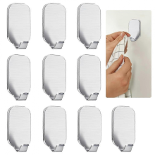 Lot de 10 crochets muraux adhésifs extra résistants en acier inoxydable, étanches et antirouille, pour salle de bain et cuisine.