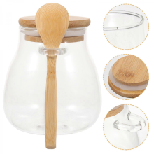 Boîte à thé en verre transparent hermétique pour conserver les feuilles de thé dans la cuisine.