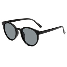 Okulary przeciwsłoneczne z polaryzacją w okrągłej oprawie w stylu retro z soczewkami UV400, wykonane z trwałych materiałów, zapewniające