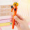 (Orange) Decompression Pen Press Movable Boxing Pen Cartoon Shape Writing Fluently Ultra-Fine Point Creative 5
