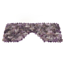 Natuurlijke, authentieke kristallen gezichtsmasker voor het verminderen van donkere kringen en het verlichten van stress. Warme en koude