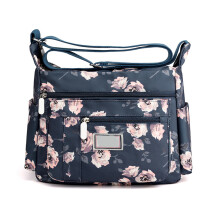 Crossbody-taske til kvinder, let skuldertaske med flere lommer og justerbar crossbody-skulderrem, vandtæt nylon-rejse-crossbody-taske