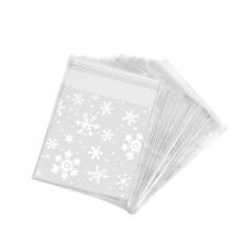 Elegante verpakking voor uw feestelijke lekkernijen: transparante zelfklevende cellofaan geschenkzakjes met sneeuwvlokmotief, geschikt voor