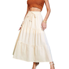 Saia maxi fluida feminina, cintura alta elástica, estilo evasê, com camadas e bolsos. Leve e confortável, ideal para o verão, com um toque boho