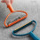 Tragbare doppelseitige Fusselentferner-Bürste 16,5x13,5 cm in Blau oder Orange 5
