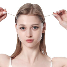 Verpakking met 20 onzichtbare V-vormige plakstrips voor een facelift