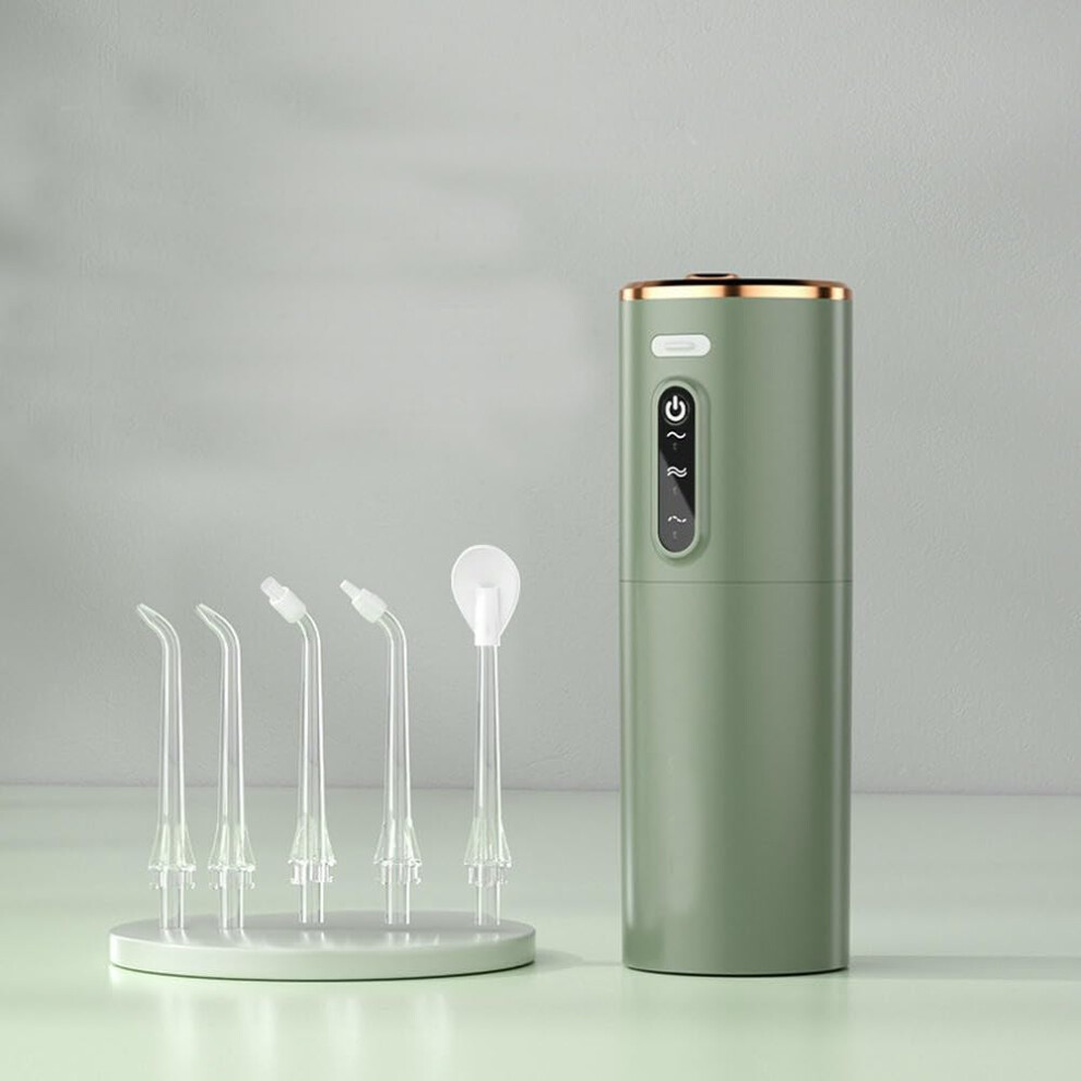 Green Cordless Portable Water Flosser Oral Irrigator With 3 Modes 5 Nozzles For Teeth Cleaning