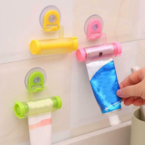 (White) Rolling Toothpaste Dispenser Tube Squeezer Sucker Hanger Gadget Tool 1